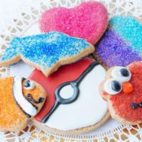 Assorted Sugar Cookies · 1 pound.
Cookie dough cut-outs decorated with sanding sugar.