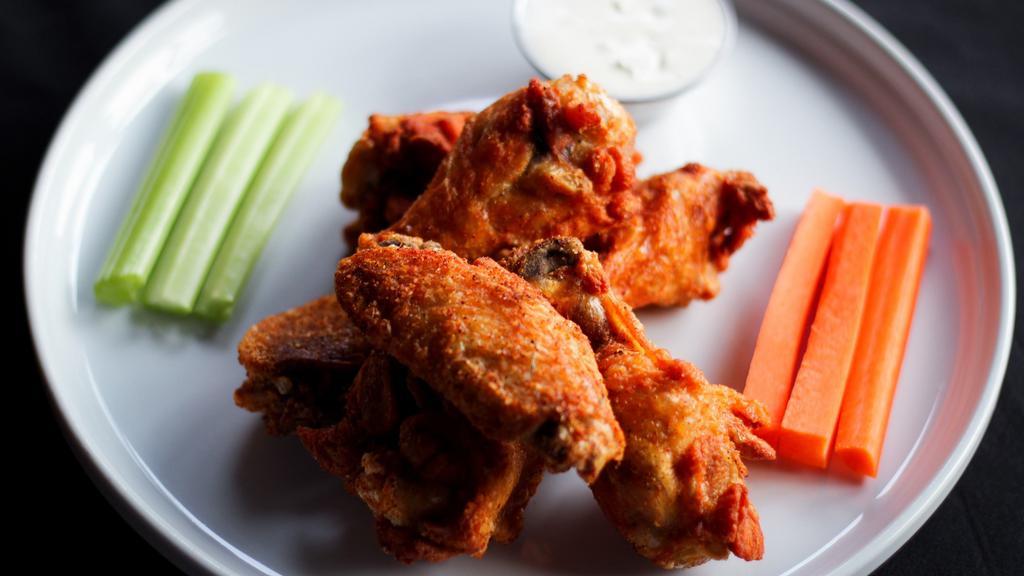 Pub Wings · Served with Carrots, Celery, Ranch, Choice of: Honey Buffalo, Dry Rub, Sweet baby Rays BBQ, Thai Lime Marinade