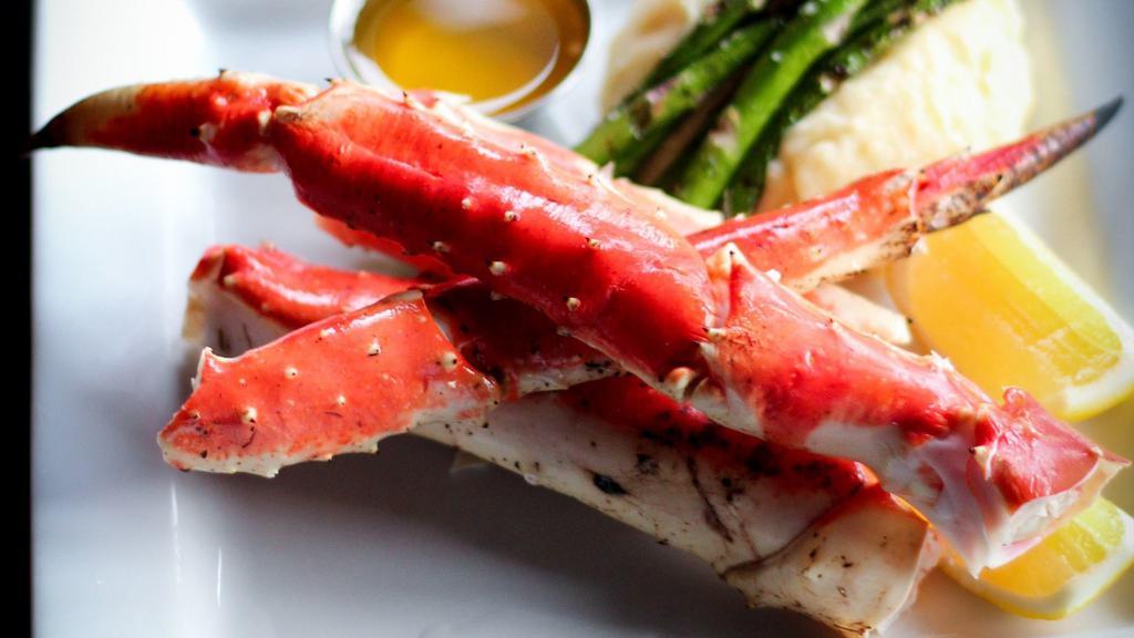 Alaskan King Crab Dinner · One pound of king crab poached in citrus and creole seasonings, served with garlic butter, mashed potatoes, green beans