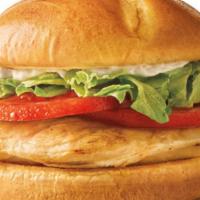 Classic Grilled Chicken Sandwich · 100% all white meat grilled chicken breast topped with fresh lettuce, ripe tomatoes and your...