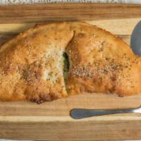 Calzone (Small) · Mozzarella and ricotta cheese with your choice of: ham, spinach or broccoli.