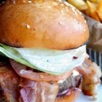 Classic Bacon Cheeseburger · Homemade angus burger, lettuce, onion, tomato, pickles, Bacon, and American cheese.