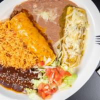 Trio Enchiladas	 · Combination of three enchiladas: shredded chicken topped with mole sauce, ground sirloin top...