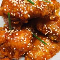 Korean Chicken Wings · (6 pc) Korean Sweet Hot Sauce, Sesame seeds.