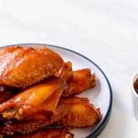 Koden Frie · Fried crispy turkey wings.