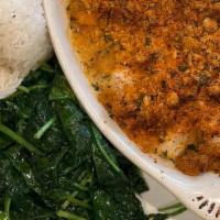 Baked Stuffed Haddock · Fresh haddock with cracker stuffing served with choice of two sides
