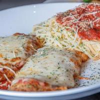 Chicken Parmigiana · Breaded chicken, topped with house made marinara sauce and fresh mozzarella cheese. Served w...