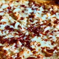 Large Chicken Bacon Ranch · Thin Crust Pizza, ranch dressing, mozzarella cheese and provolone cheese topped with bacon a...