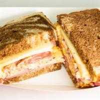 The New Yorker · Swiss cheese, corned beef, pastrami, cole slaw, russian dressing on marble rye.