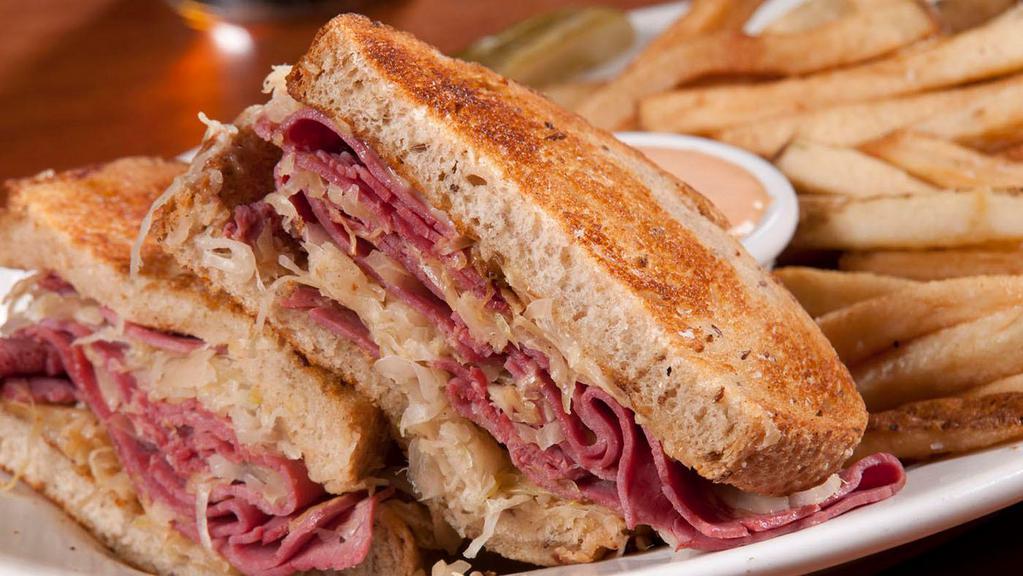 Shelly'S Reuben · Your choice of turkey or corned beef on toasted deli rye bread with sauerkraut, melted swiss cheese and 1000 island dressing.