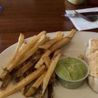 Chicken Fajita Wrap · Cheddar and pepper jack cheese, grilled chicken, sautéed peppers and onions served with guac...
