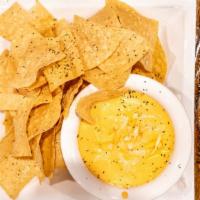 Buffalo Chicken Dip · Three cheese blend of Cheddar, Monterey jack & soft pepper with shredded roasted chicken mix...