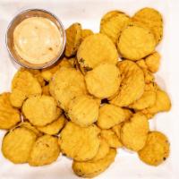 Fried Pickles · Crisp kosher dill pickles battered & fried. Served with spicy ranch or Thousand Island dress...