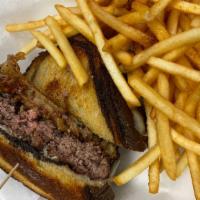 Patty Melt · Chicken or 100% black angus beef loaded with grilled onions & melted swiss cheese on grilled...