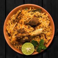 Lamb Biryani Lust · Long grained rice flavored with fragrant spices flavored along with saffron and layered with...