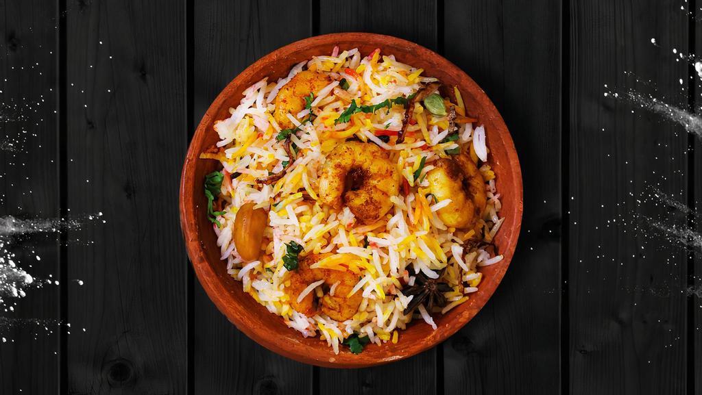 Shrimp Biryani Special · Long grained rice flavored with fragrant spices flavored along with saffron and layered with shrimp and cooked with biryani masala gravy