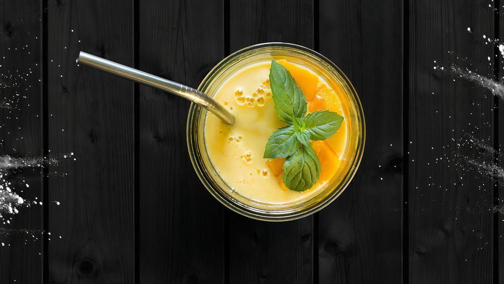 Churned Yogurt Mango Smoothie · Creamy mango lassi made with sweet mangoes, yogurt, and a touch of cardamom.