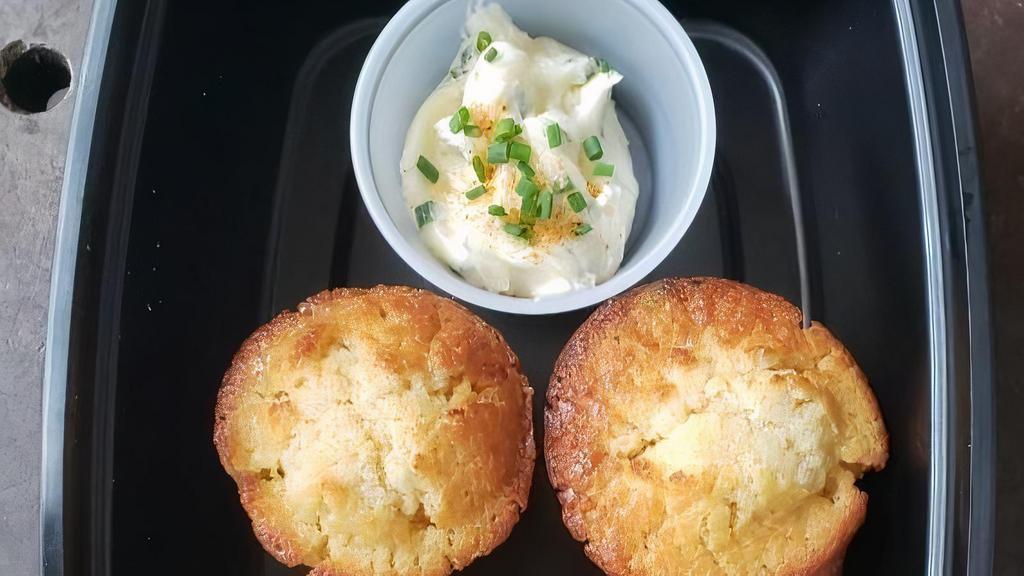 Honey Jalapeno Cornbread · 4 pieces of honey, jalapeno cornbread. Served with an honey chive butter.