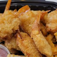 Fried Shrimp Dinner · 12 pieces of fried shrimp served with old bay fries and our house made tartar sauce.