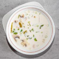 Tom Kah * · Spicy.  Coconut milk herbal soup, mushroom,
lemongrass.
