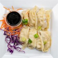 6 Gyozas · Steamed or fried, stuffed pork served with honey soy sauce.