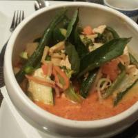 Red Curry · Bamboo shoots, bell pepper, green bean, zucchini and basil leaves in coconut milk.