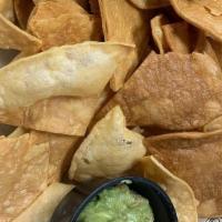 Family Style Chips And Dip · House made guac and pico