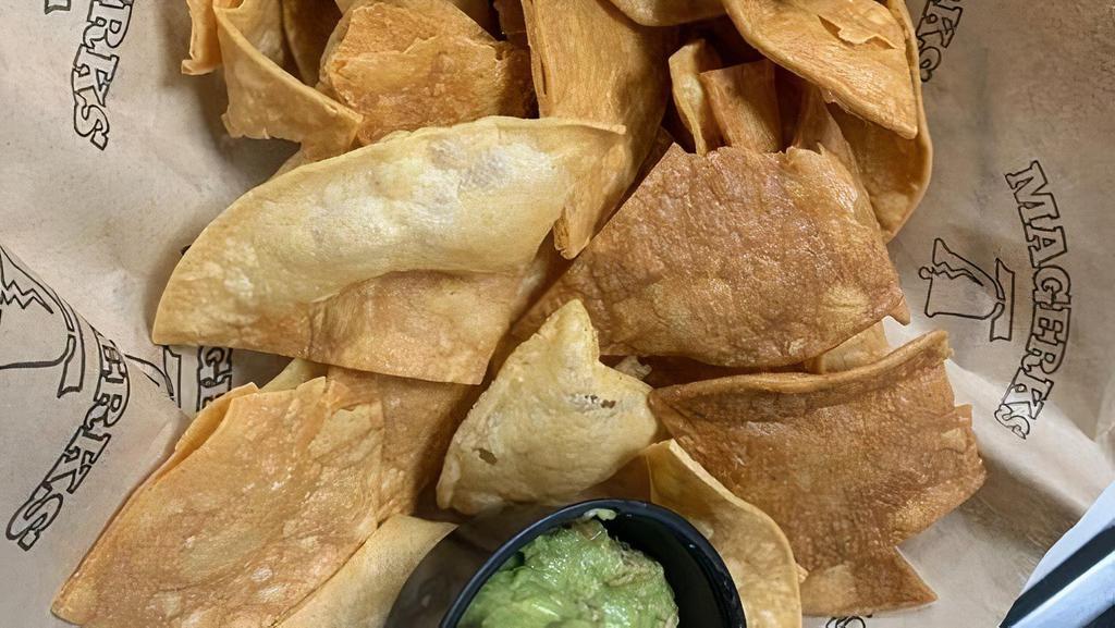 Family Style Chips And Dip · House made guac and pico