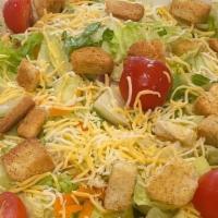 Chopped Garden Salad · Romaine, Cucumber, Tomato, Red Onion Shredded Cheddar, Croutons