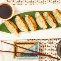 Pork Gyoza · Pan-fried Japanese dumplings.