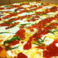 Brooklyn Style Pizza · A square thin crust pizza with olive oil, fresh mozzarella, grated parmesan, fresh basil, an...