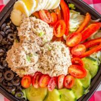 Tuna Salad · With freshly made tuna, lettuce, tomatoes, onion, green peppers, cucumber, olives and egg.