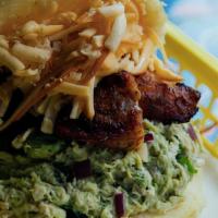 Reina Pepiada Especial · Chicken-avocado-salad with mayo, onions, and cilantro, fried sweet plantains, and gouda chee...
