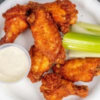 Bone In Wings 6 Piece · Regular bone-in wings breaded and served with blue cheese and celery.