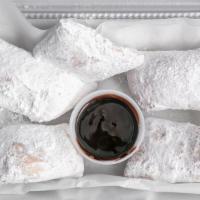 Fried Dough · Served with powdered sugar, chocolate or raspberry sauce.