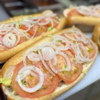Cheesesteak Hoagie · Lettuce tomatoes and onions.