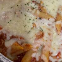 Baked Ziti Bolognese · Layers of ziti and zesty meat sauce topped with ricotta cheese and mozzarella.