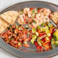 Marinated Shrimp Platter · Served over rice and grilled vegetables.