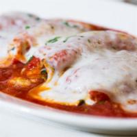 Involtini Di Melanzane (Dinner) · Baked eggplant rolled with fresh Ricotta cheese and spinach in light tomato sauce.