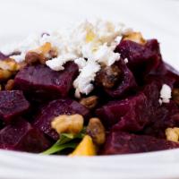 Insalata Di Barbabietole · Roasted beets with spinach, goat cheese, toasted walnuts, and orange segments with sherry vi...
