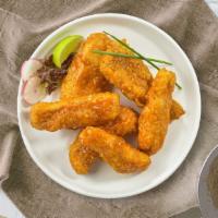 Buffalo Tenders · Buffalo chicken finger breaded and fried until golden brown before being tossed in buffalo s...