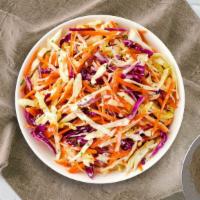 Cole Slaw  · (Vegetarian) Shredded cabbage and carrots dressed in mayonnaise and apple cider vinegar.