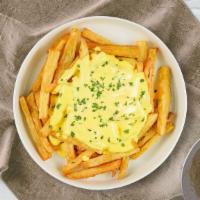 Fries With Cheese Whiz  · (Vegetarian) Idaho potato fries cooked until golden brown and topped with cheese whiz.
