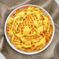 Waffle Fries With Cheese  · (Vegetarian) Idaho potatoes sliced in an alternating waffle pattern, fried until golden brow...