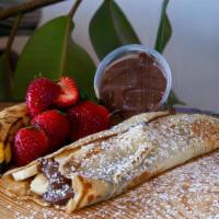 Nutella Crepe · Nutella, Banana, Strawberry, Whipped Cream, Powdered Sugar