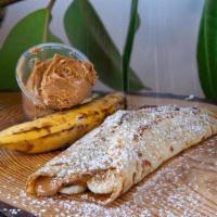 Peanut Butter Crepe · Peanut Butter, Banana, Honey, Whipped Cream and Powdered Sugar