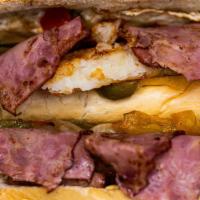 Breakfast Hoagie · 3 Eggs with Meat, Provolone Cheese, Fried Peppers and Onions with a Hashbrown on a 12