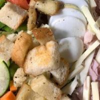 Chef Salad · Our Tossed Salad with Turkey, Ham, American Cheese and a Hard Boiled Egg with Croutongs