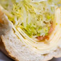 Mixed Cheese Hoagie · Provolone, American and Swiss Cheese Topped with Lettuce, Tomato and Onion