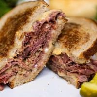 Reuben · Corned Beef with Swiss Cheese, Sauerkraut, Russian Dressing on Grilled Rye